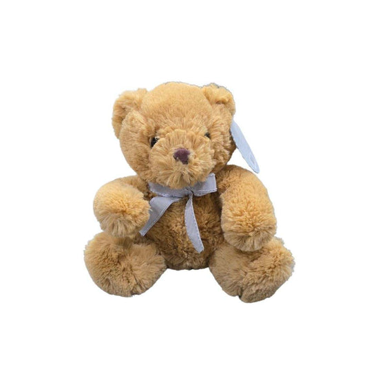 Brown teddy bear plush toy sitting on white background
