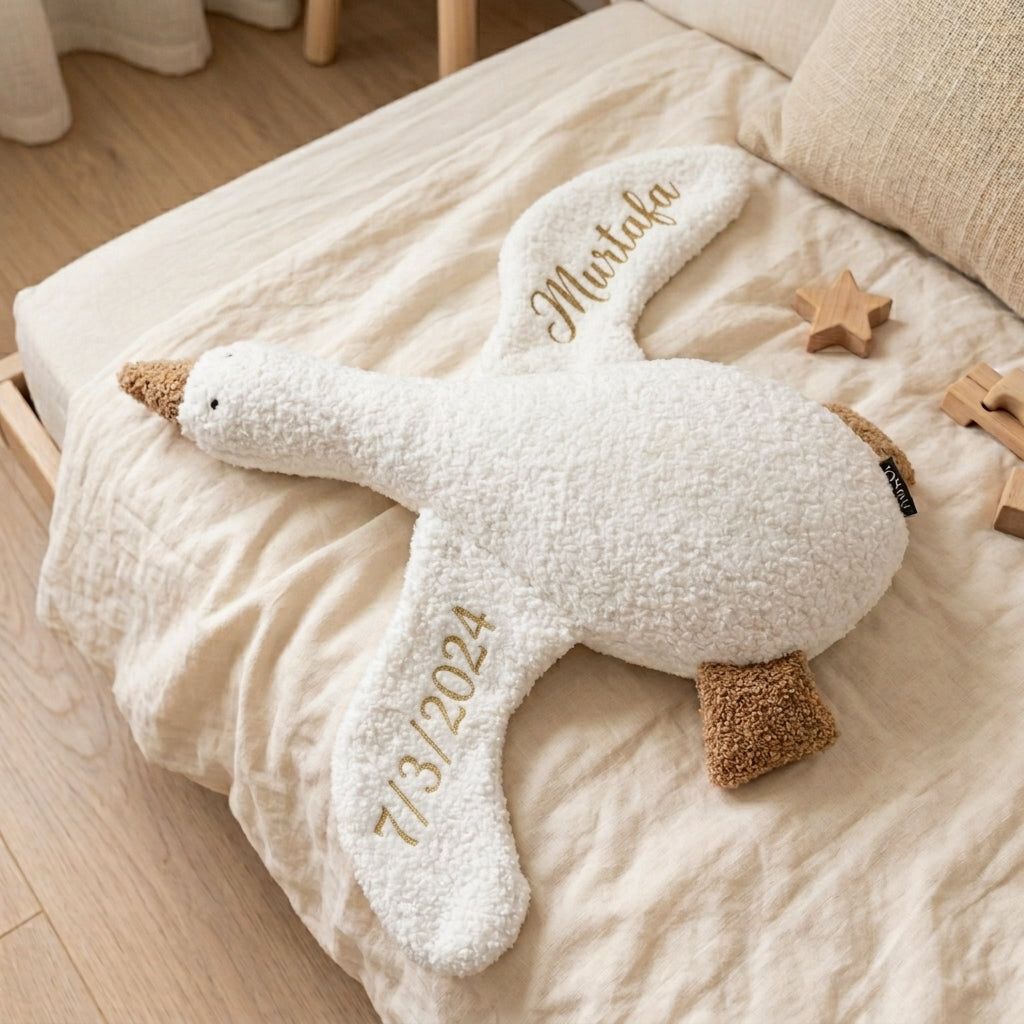 Dreamy Goose personalised baby name cushion by MYLU in white bouclé with beige details