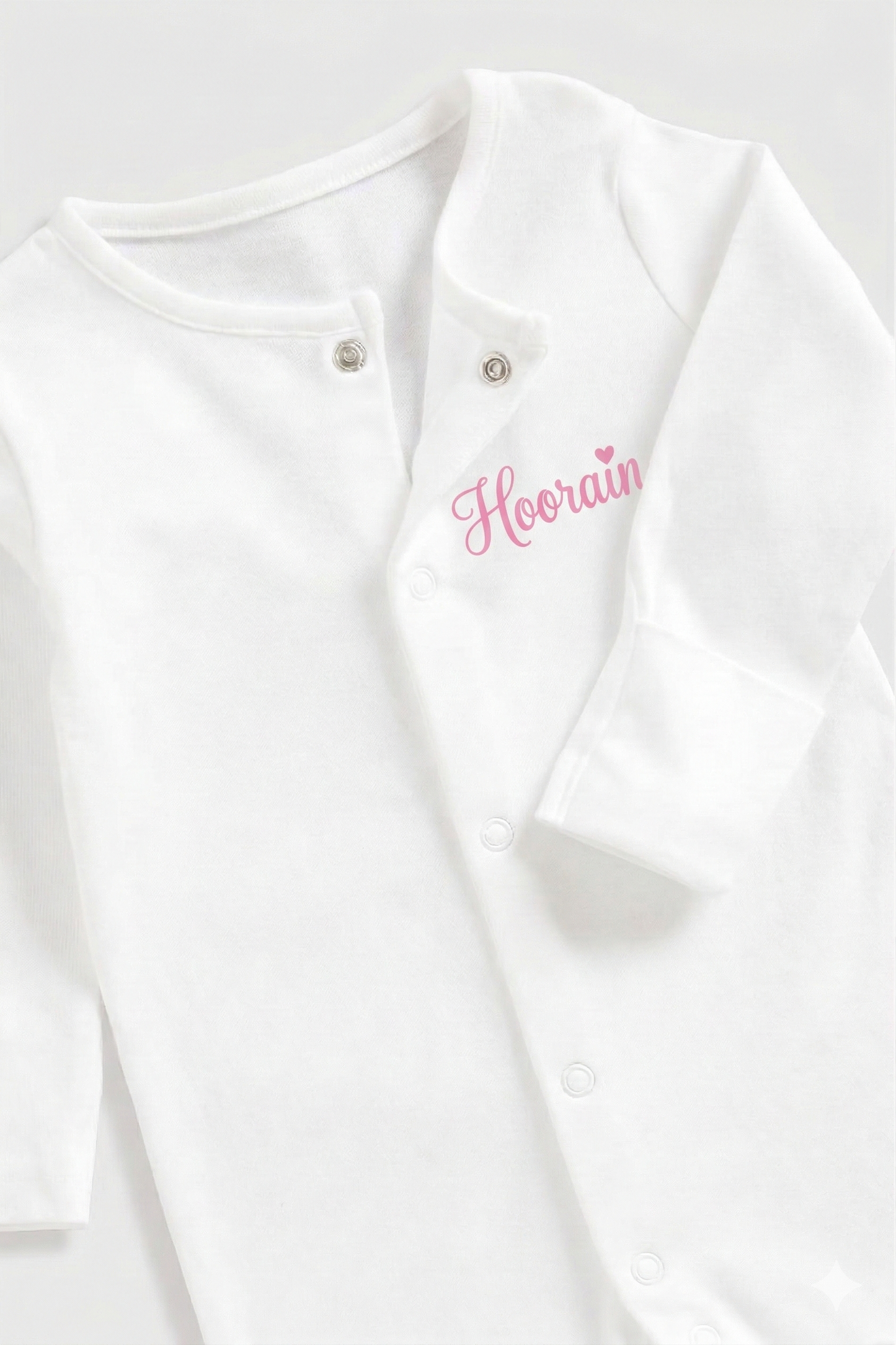 Personalised baby onesie with custom name on soft cotton fabric, ideal keepsake gift for newborns