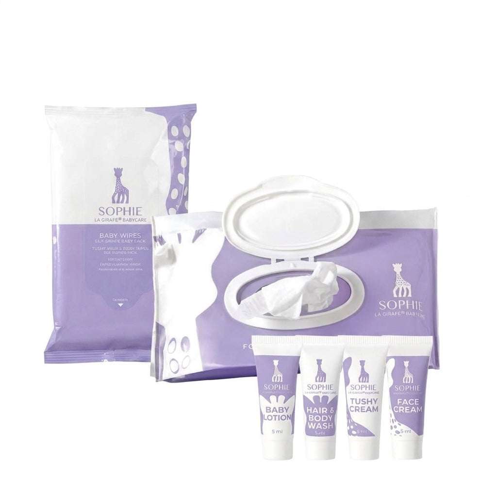 Sophie la Girafe Babycare Tiny Traveler Kit with cleansing wipes and mini skincare essentials in a reusable travel pouch