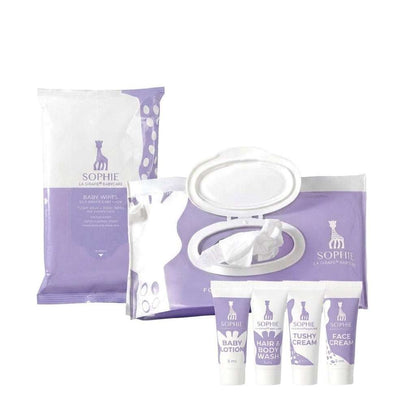 Sophie la Girafe Babycare Tiny Traveler Kit with cleansing wipes and mini skincare essentials in a reusable travel pouch